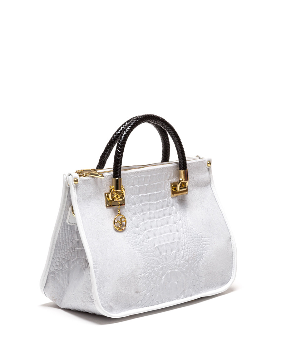 White handbag sale Shop the latest styles in women's handbags from Vince Camuto: find clutches, cross body bags, totes & more. Free shipping on all orders! Vince Camuto.